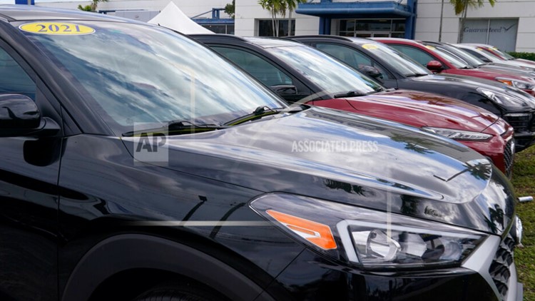 Chip shortage keeps driving up auto prices, cutting sales